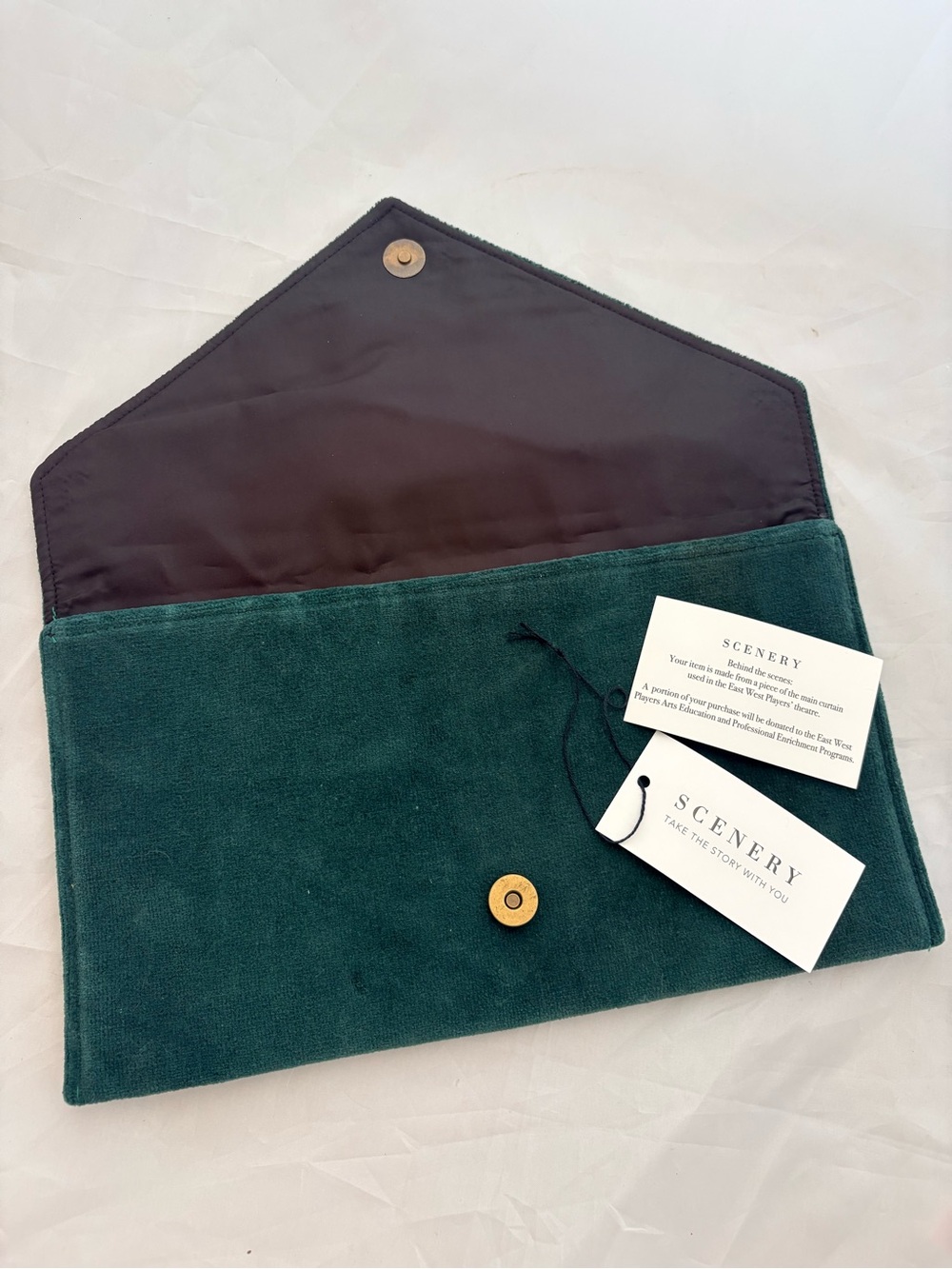 Scenery Brand clutch made with Upcycled Theater Curtain